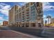 Modern high-rise building featuring a sleek design and private balconies at 353 E Bonneville Ave # 752, Las Vegas, NV 89101