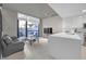 Bright open living space with a modern kitchen and access to an outdoor patio at 353 E Bonneville Ave # 752, Las Vegas, NV 89101
