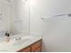 Simple half bathroom with a white sink and mirror, perfect for guests with a clean and functional design at 3866 Starfield Ln, Las Vegas, NV 89147