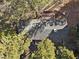 Aerial shot of the roof, surrounded by trees, showing details of deck and construction at 4154 Matterhorn Way, Mount Charleston, NV 89124