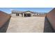 Spacious backyard with dirt landscaping and block wall fencing, ready for customization at 4485 E Brusca Way, Pahrump, NV 89061