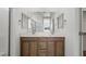 Elegant bathroom with dual vanity sinks, a large mirror, and ample counter space at 4485 E Brusca Way, Pahrump, NV 89061
