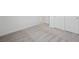 Simple bedroom space featuring neutral colored carpeting, white baseboards and doors, and a window at 4485 E Brusca Way, Pahrump, NV 89061