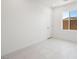 Bright, minimalist bedroom with a large window at 4485 E Brusca Way, Pahrump, NV 89061