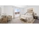 Cozy bedroom with natural light, neutral tones, and comfortable furnishings for relaxation at 4485 E Brusca Way, Pahrump, NV 89061