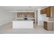 Modern kitchen with a spacious island, perfect for cooking and entertaining guests at 4485 E Brusca Way, Pahrump, NV 89061
