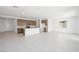 Open-concept living area featuring a modern kitchen, bright lighting, and expansive tile flooring throughout at 4485 E Brusca Way, Pahrump, NV 89061