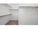 A spacious walk-in closet has multiple shelves and rods, offering storage for clothing and accessories at 4485 E Brusca Way, Pahrump, NV 89061