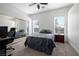 Cozy bedroom with a comfortable bed, ample natural light, and a mirrored closet, creating a relaxing space at 8290 Gagnier Blvd, Las Vegas, NV 89113