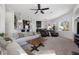 Open concept living area flowing into the kitchen and dining spaces, perfect for entertaining and Gathering at 8290 Gagnier Blvd, Las Vegas, NV 89113