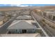 Aerial view of a single-Gathering home with an outdoor patio area and landscaped backyard at 905 Belleforte Ln, Las Vegas, NV 89138