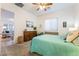 Calm bedroom with a ceiling fan, bench, plush carpet, and connecting living space at 905 Belleforte Ln, Las Vegas, NV 89138