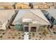 View of a well maintained single-Gathering home with stone accents and desert landscaping at 905 Belleforte Ln, Las Vegas, NV 89138