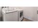 Convenient laundry area with a modern, white washer and dryer set at 905 Belleforte Ln, Las Vegas, NV 89138