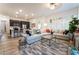 Spacious living room with recessed lighting, tile floors, and comfortable seating at 905 Belleforte Ln, Las Vegas, NV 89138