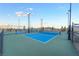 Enjoy a game of pickleball at the community courts, featuring lighting for evening play at 905 Belleforte Ln, Las Vegas, NV 89138