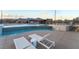 Resort-style pool with sleek lounge chairs offering a relaxing atmosphere and modern design at 905 Belleforte Ln, Las Vegas, NV 89138