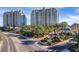Stunning high-rise condos feature lush landscaping, palm trees, and gated entry at 9103 Alta Dr # 102, Las Vegas, NV 89145