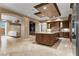 Open kitchen with a large island, breakfast bar, and stainless steel appliances at 9103 Alta Dr # 102, Las Vegas, NV 89145