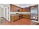 Gourmet kitchen features custom cabinets, stainless steel appliances, and sleek countertops at 9103 Alta Dr # 102, Las Vegas, NV 89145
