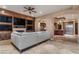 Entertain in this spacious living room with custom cabinetry, fireplace, and comfortable seating at 9103 Alta Dr # 102, Las Vegas, NV 89145