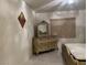 Well-lit bedroom featuring a decorative dresser and comfortable bed at , Las Vegas, NV 89148