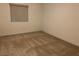 Bedroom with carpeted floors and a window bringing in natural light at , Las Vegas, NV 89148