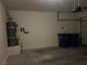 Spacious garage with water heater and trash receptacles, providing a functional and organized area for parking and storage at , Las Vegas, NV 89148