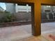 An outdoor patio area surrounded by a brick wall and greenery offers a private and tranquil space at , Las Vegas, NV 89148