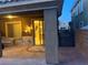 Covered patio with outdoor seating and access to the home, creating an inviting outdoor living area at , Las Vegas, NV 89148
