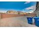 Backyard with perimeter wall ready for your landscaping design at 10306 Coastline Creek Ct, Las Vegas, NV 89141