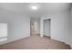 Clean bedroom with closet, carpet, white walls, and window for natural light at 10306 Coastline Creek Ct, Las Vegas, NV 89141