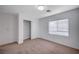 Neutral bedroom offers carpet, closet and white walls, plus a window for natural light at 10306 Coastline Creek Ct, Las Vegas, NV 89141