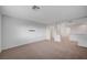 Upstairs bonus room featuring carpet flooring and ample space at 10306 Coastline Creek Ct, Las Vegas, NV 89141