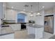 Modern kitchen featuring a center island, stainless appliances, and recessed lighting at 10306 Coastline Creek Ct, Las Vegas, NV 89141