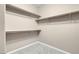 Walk-in closet with carpet and multiple levels of shelving at 12836 Alcores St, Las Vegas, NV 89141