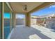 Covered patio with tiled flooring, offering a relaxing outdoor space at 12836 Alcores St, Las Vegas, NV 89141
