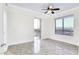 Inviting bedroom filled with natural light featuring cityscape views and tiled floors at 200 W Sahara Ave # 3512, Las Vegas, NV 89102