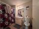 Functional bathroom with shower and essential fixtures, and tiled floors at 2101 Sun Ave, North Las Vegas, NV 89030
