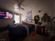 Comfortable bedroom with ceiling fan and tiled flooring at 2101 Sun Ave, North Las Vegas, NV 89030