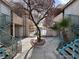 Inviting courtyard view with walkways, lush greenery, and access to multiple units through staircase at 2101 Sun Ave, North Las Vegas, NV 89030