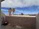 Patio with a view of palm trees, buildings, and a blue sky at 2101 Sun Ave, North Las Vegas, NV 89030