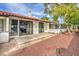 Rear exterior view showcasing the private patio and well-maintained grounds at 2579 La Fortuna Ave, Las Vegas, NV 89121