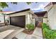 Charming single-story home with a two car garage and wrought-iron gate at 2579 La Fortuna Ave, Las Vegas, NV 89121