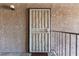 The entrance to the condo featuring a screen door and a small porch area at 2606 S Durango Dr # 232, Las Vegas, NV 89117