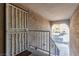 Condo entrance featuring a security screen door and exterior walls with a textured finish at 2606 S Durango Dr # 232, Las Vegas, NV 89117