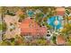 Stunning aerial view of the estate showcasing the red tile roofs, pools, and lush landscaping at 2818 E Quail Ave, Las Vegas, NV 89120