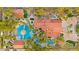 Aerial view of a sprawling estate featuring a large home, pool, lush landscaping, and outdoor entertainment areas at 2818 E Quail Ave, Las Vegas, NV 89120