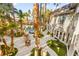 Lush backyard with pool, spa, firepit, and lounge areas at 2818 E Quail Ave, Las Vegas, NV 89120