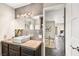 Bright bathroom with sleek vanity, sink, and modern lighting at 2818 E Quail Ave, Las Vegas, NV 89120